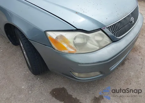 2000 Toyota Avalon Xls z USA, uszkodzony, nr VIN 4T1BF28BXYU013685